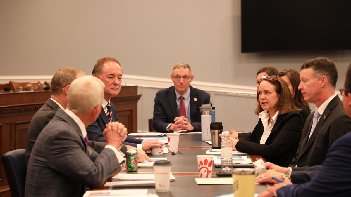 Members of the caucus in a meeting